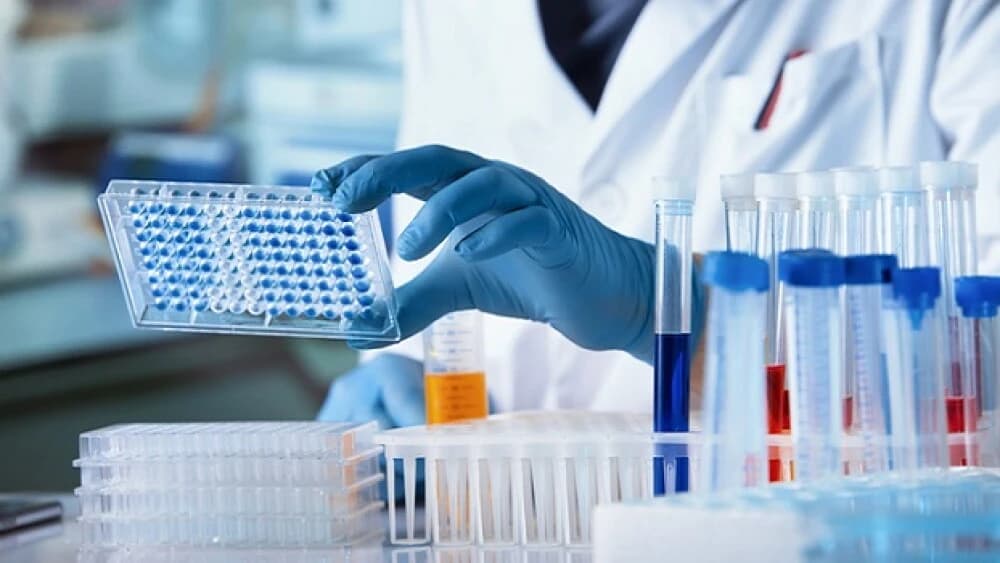Tiragena scientist preparing samples in the laboratory