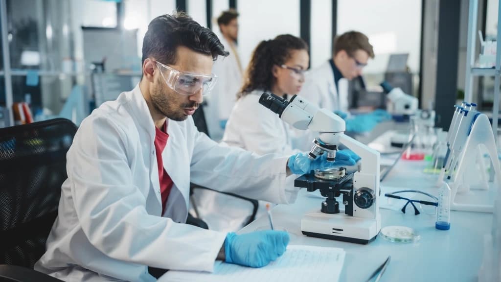 Tiragena research team conducting laboratory science